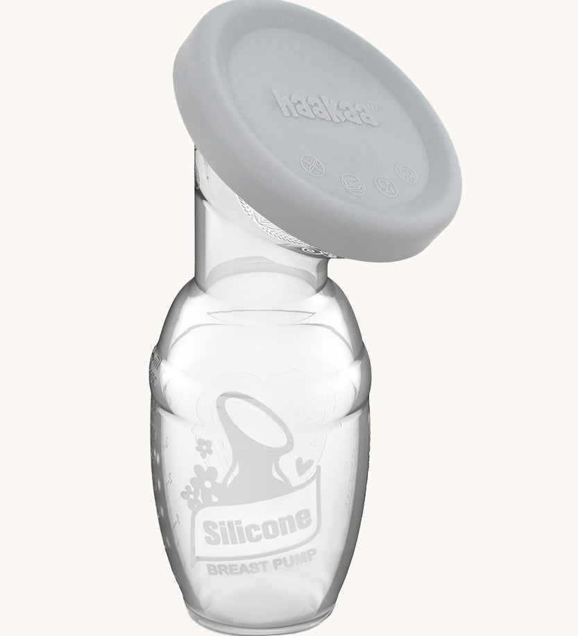 Haakaa Generation 1 100ml Silicone Breast Pump & Silicone Cap Gift Box Set. The Cap is in Grey