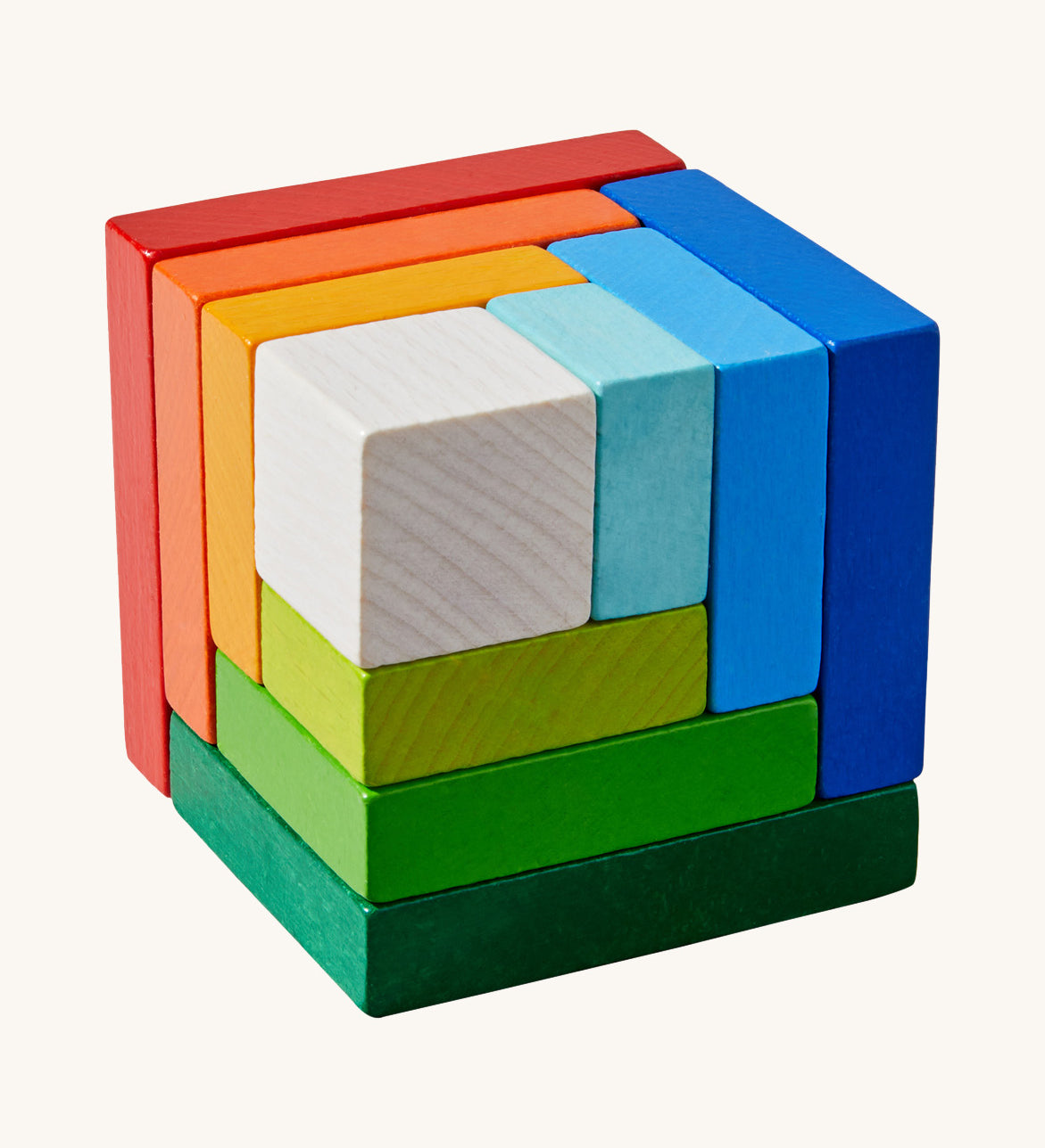 A wooden 3D Haba rainbow cube arranging puzzle on a cream background.