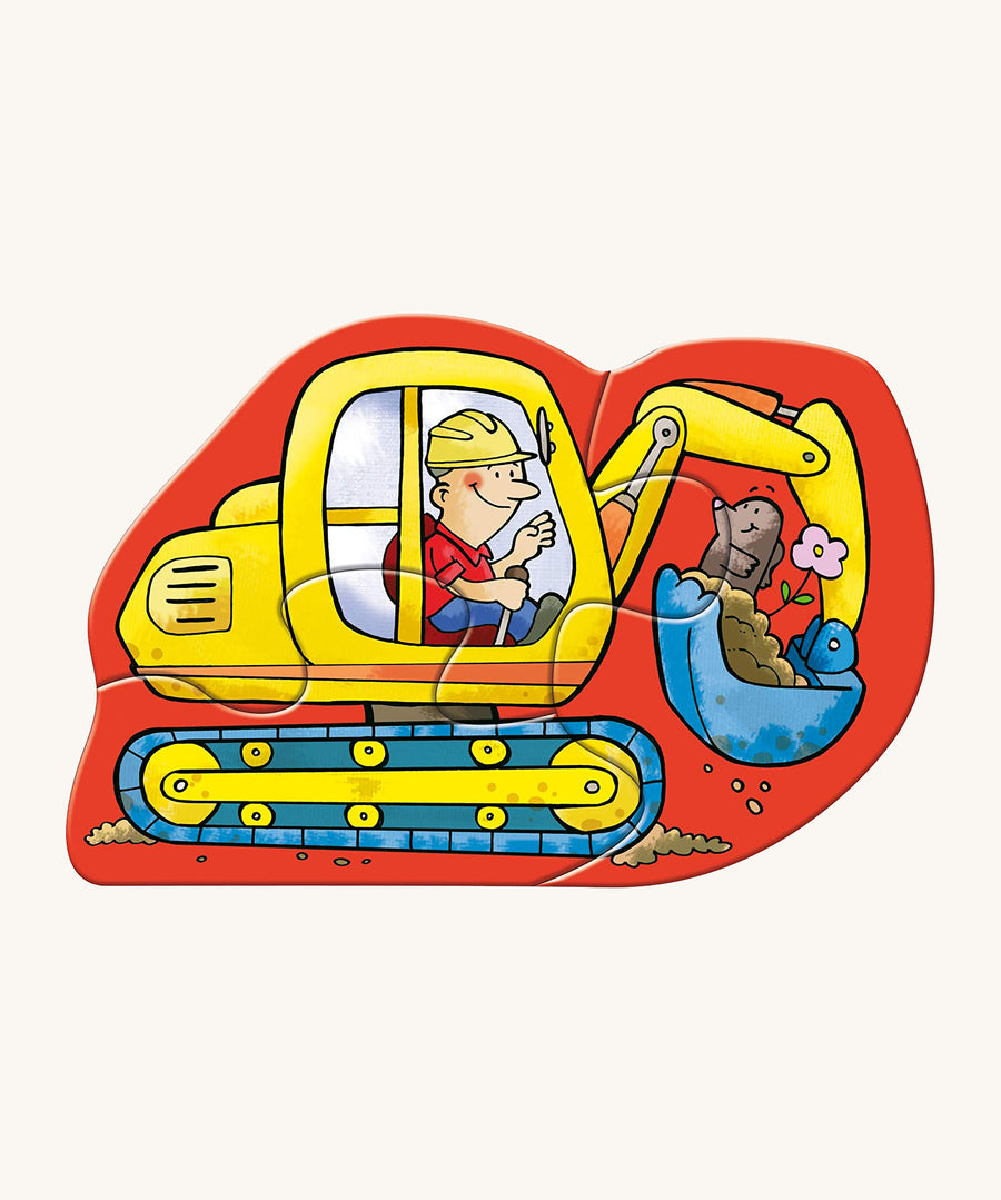 A digger jigsaw piece from the Haba construction jigsaw set on a cream background.