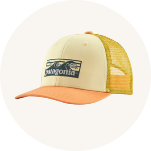 Patagonia cap on cream background to represent children's hats and gloves at Babipur.