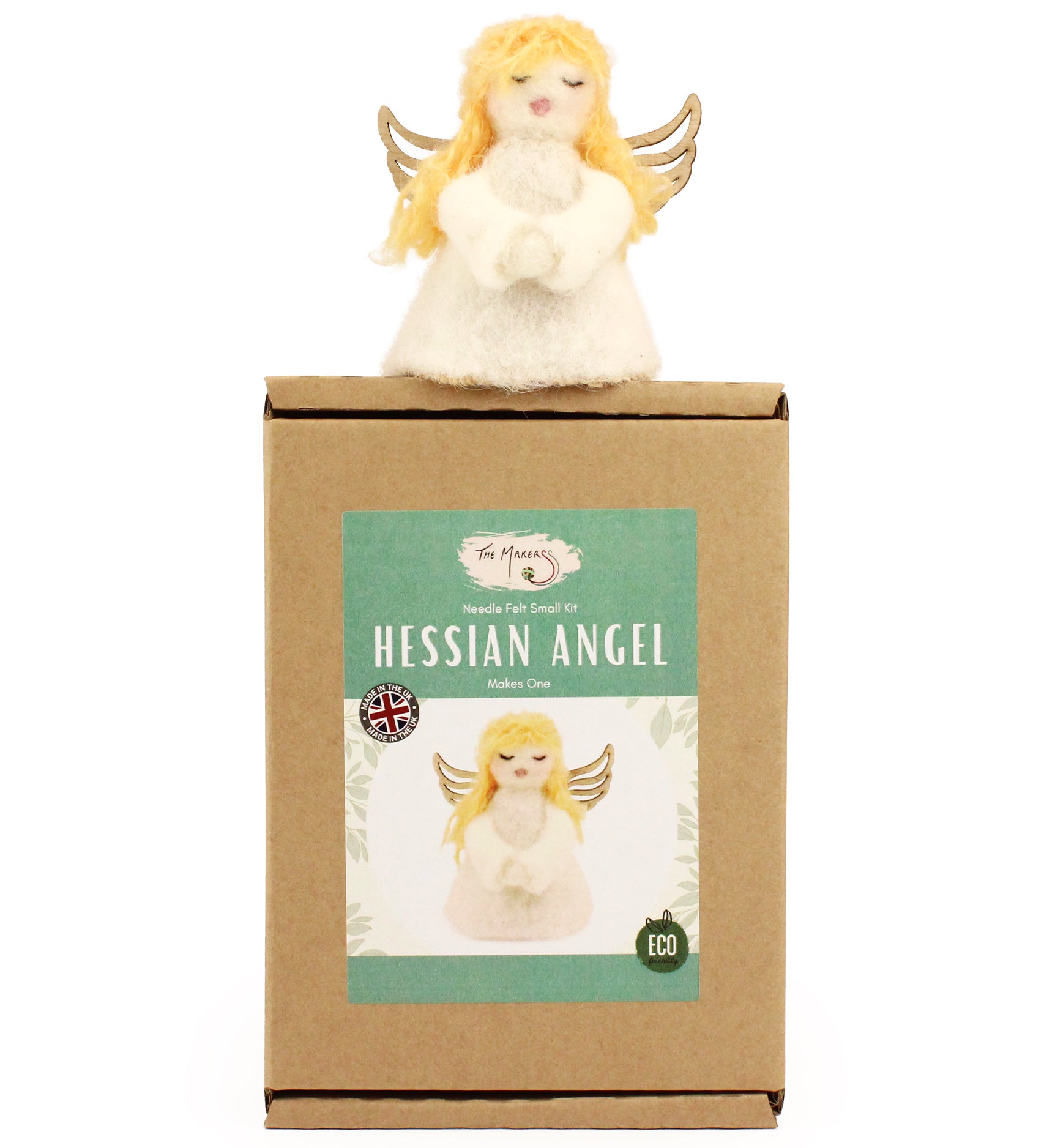 The Makerss - Angel Needle Felt Kit, complete angel sat on top of its cardboard packaging.