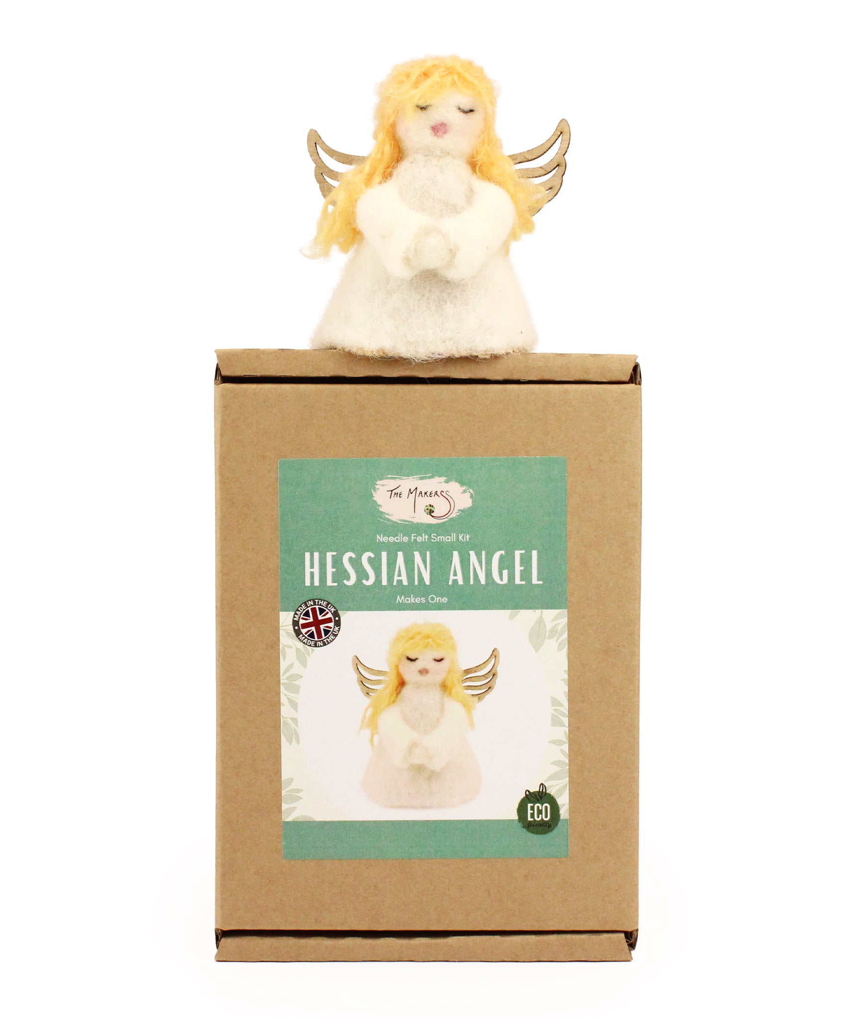 The Makerss - Angel Needle Felt Kit, complete angel sat on top of its cardboard packaging.