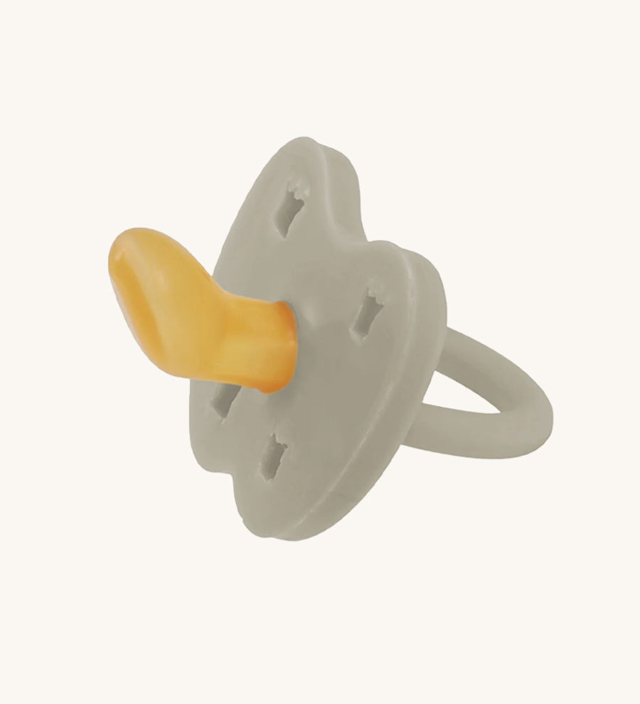 Hevea Orthodontic Baby Pacifier - 0-3 Months in Oatmeal on a cream background