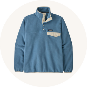 Patagonia blue fleece on cream background to represent men's fleeces and hoodies at Babipur.