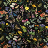 Flower Garden is a beautifully illustrated floral design in soft organic cotton featuring colourful garden flowers and butterflies on a black background.