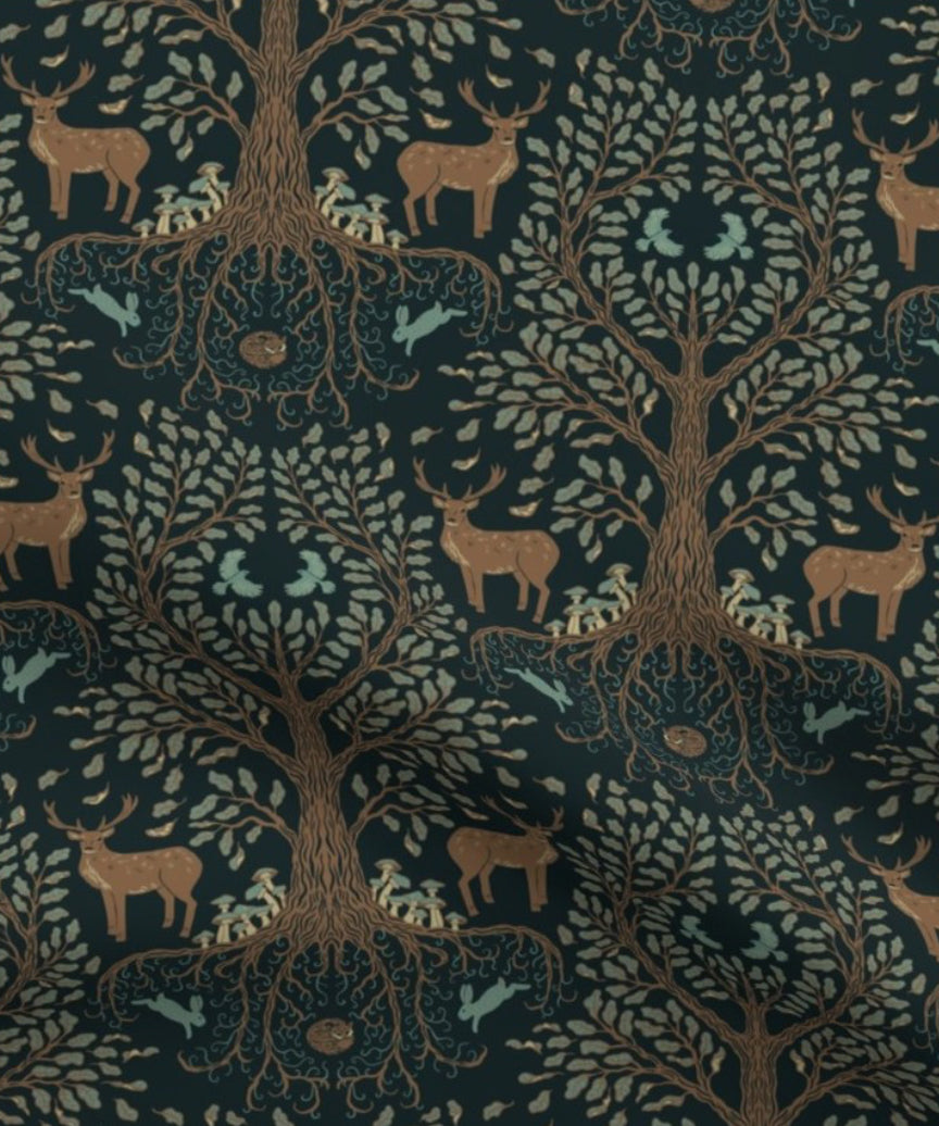 Forest Tree is a beautifully illustrated woodland design in soft organic cotton featuring intricate woodland trees and stags in muted colours on a black background.