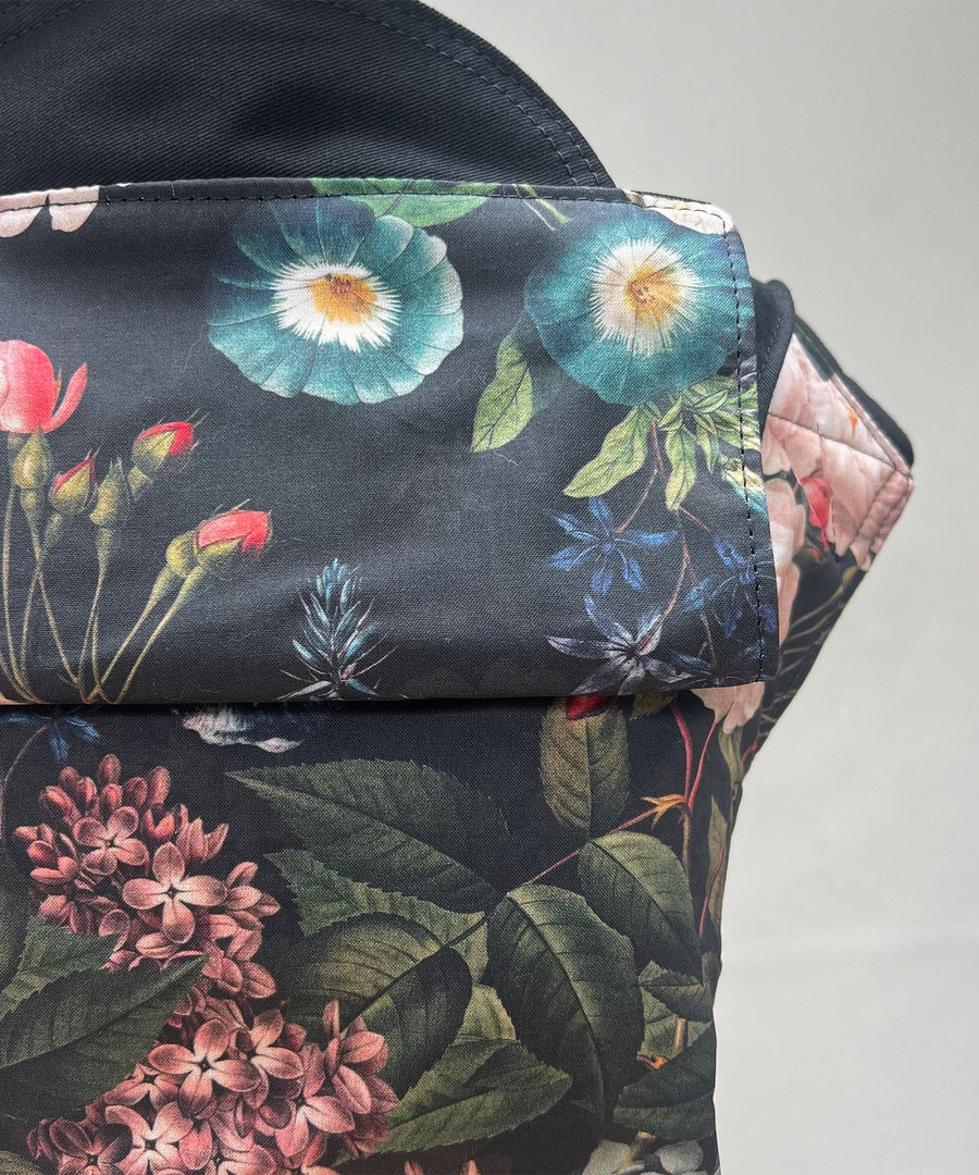 Integra Baby Carrier - Vintage Summer. Vintage Summer is a beautiful Victorian botanical floral print in soft organic cotton featuring hydrangeas, lilac and roses on a black background.