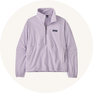 Patagonia purple microdini fleece on cream background to represent women's jumpers and fleeces at Babipur.