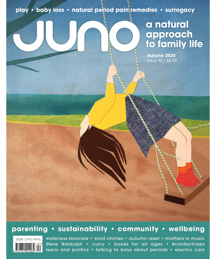 Juno Magazine Autumn 2024 Issue 92 shows a drawing of a person bending backwards whilst swinging on a swing. The person has brown hair, a yellow top, blue skirt, orange socks and red ankle boots. The front cover reads "Juno a natural approach to family life".