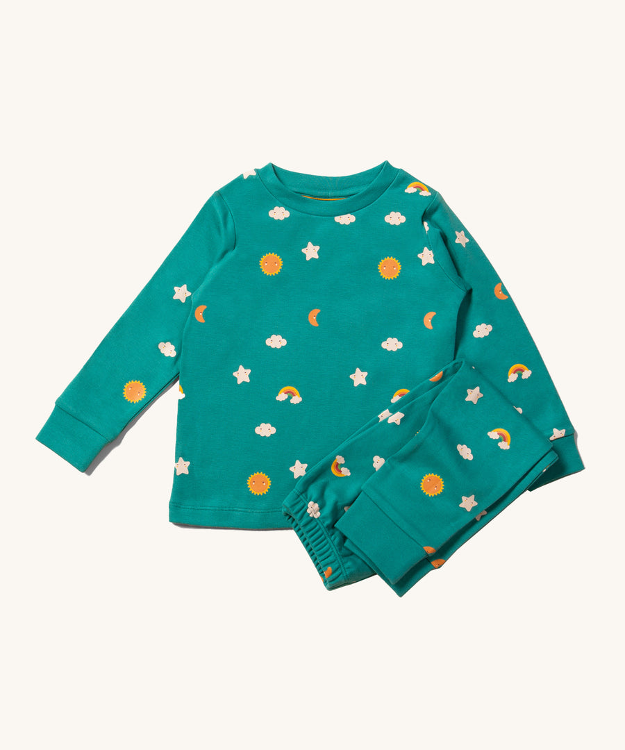 Little Green Radicals  Organic Pyjamas - Turquoise Skies. Turquoise blue fabric with a lovely sun, clouds, and rainbows all-over print on the top and trousers