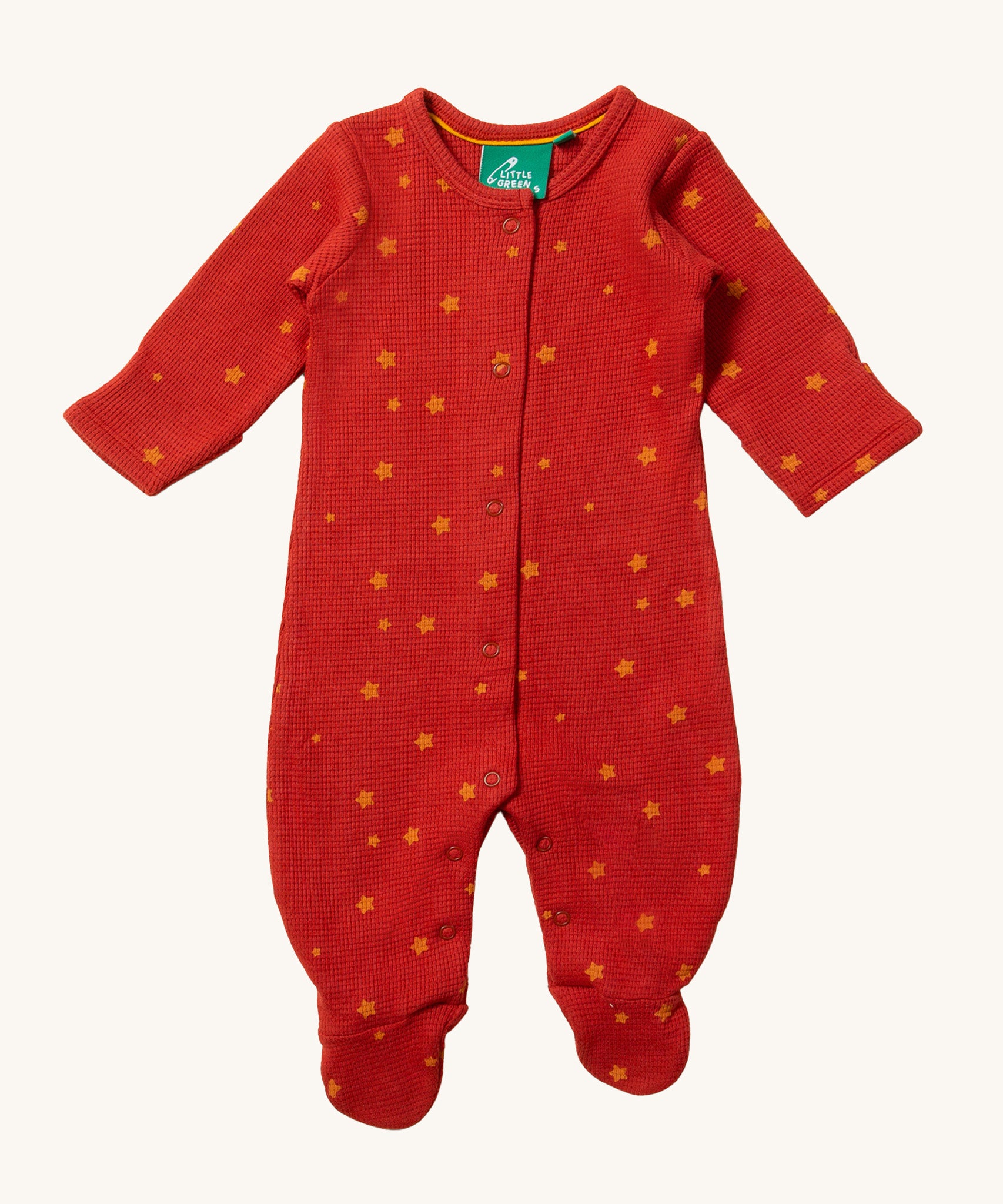 LGR Waffle Babygrow - Hazlenut Stars in a beautiful red fabric, with waffle texture and golden start print all over