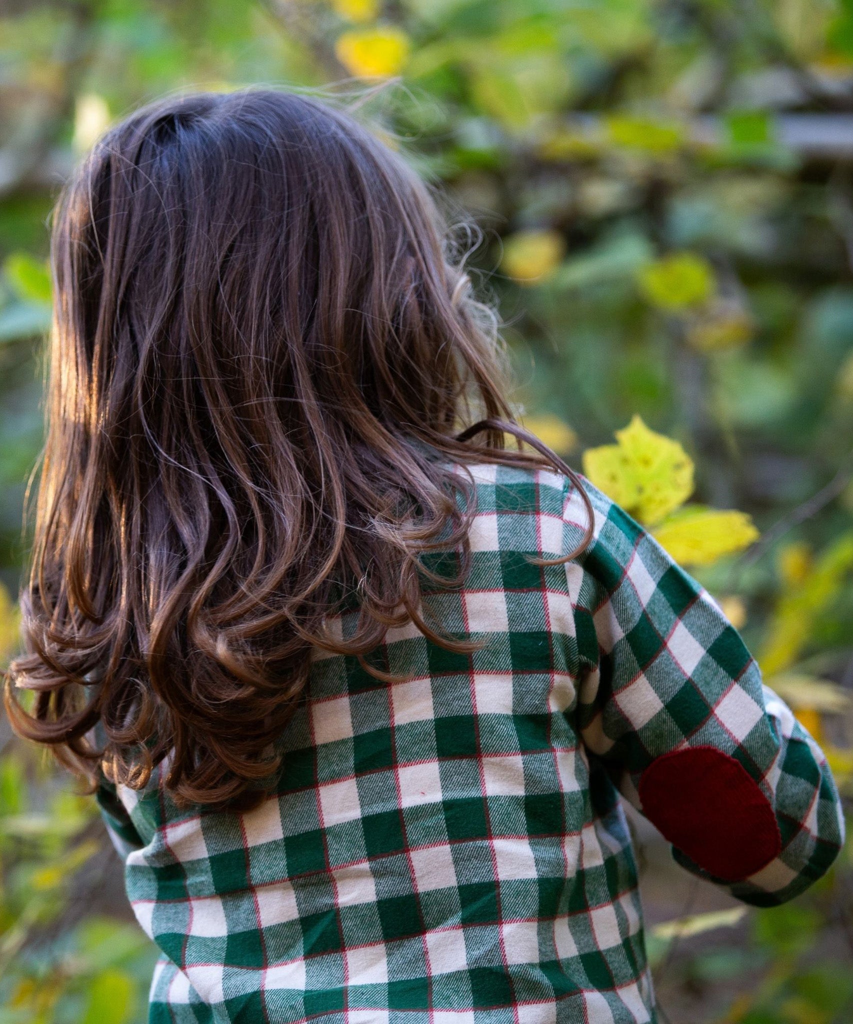 The back of the Little Green Radicals Check Long Sleeve Shirt - Fern Green, showing the red cord elbow patches on the shirt