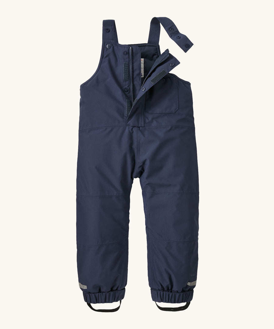 Patagonia Baby Snow Pile Bibs - New Navy showing the zip up wind-flap and adjustable shoulder straps