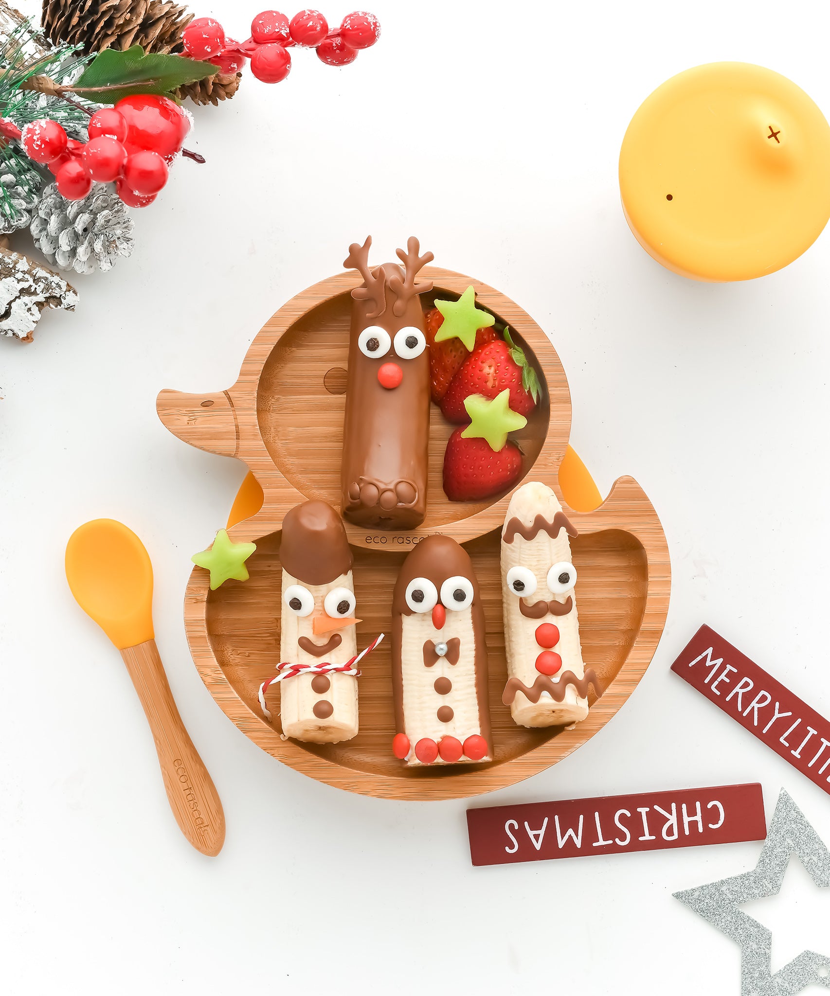 Eco Rascals Duck Bamboo Suction Plate, with Christmas inspired fruit treats. 