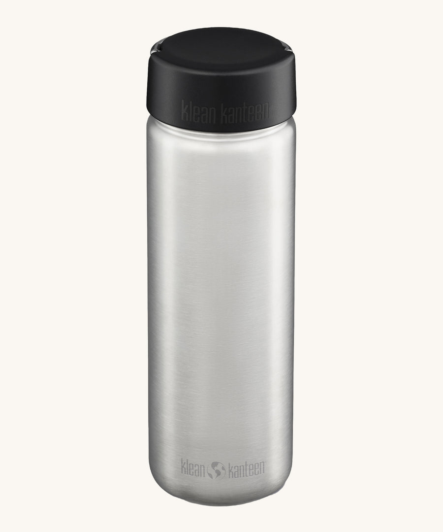 Klean Kanteen 27oz Wide Bottle with loop cap, on a cream background