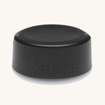 Klean Kanteen Wide Loop Cap - With Bale, in black. A stainless steel cap with carry handle on a plain background