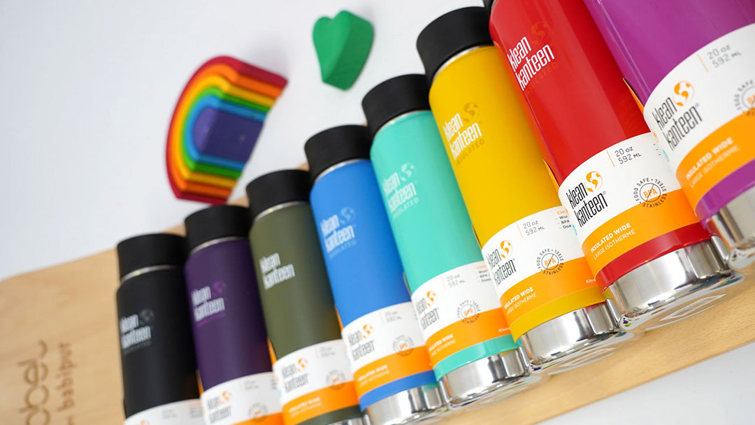 Klean Kanteen bottles set up in order of rainbow colours