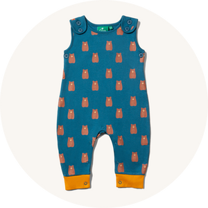 Little Green Radicals Everyday Dungarees - Fairtrade and GOTS organic cotton navy baby dungarees with a brown teddy bear print and bright gold cuffs.