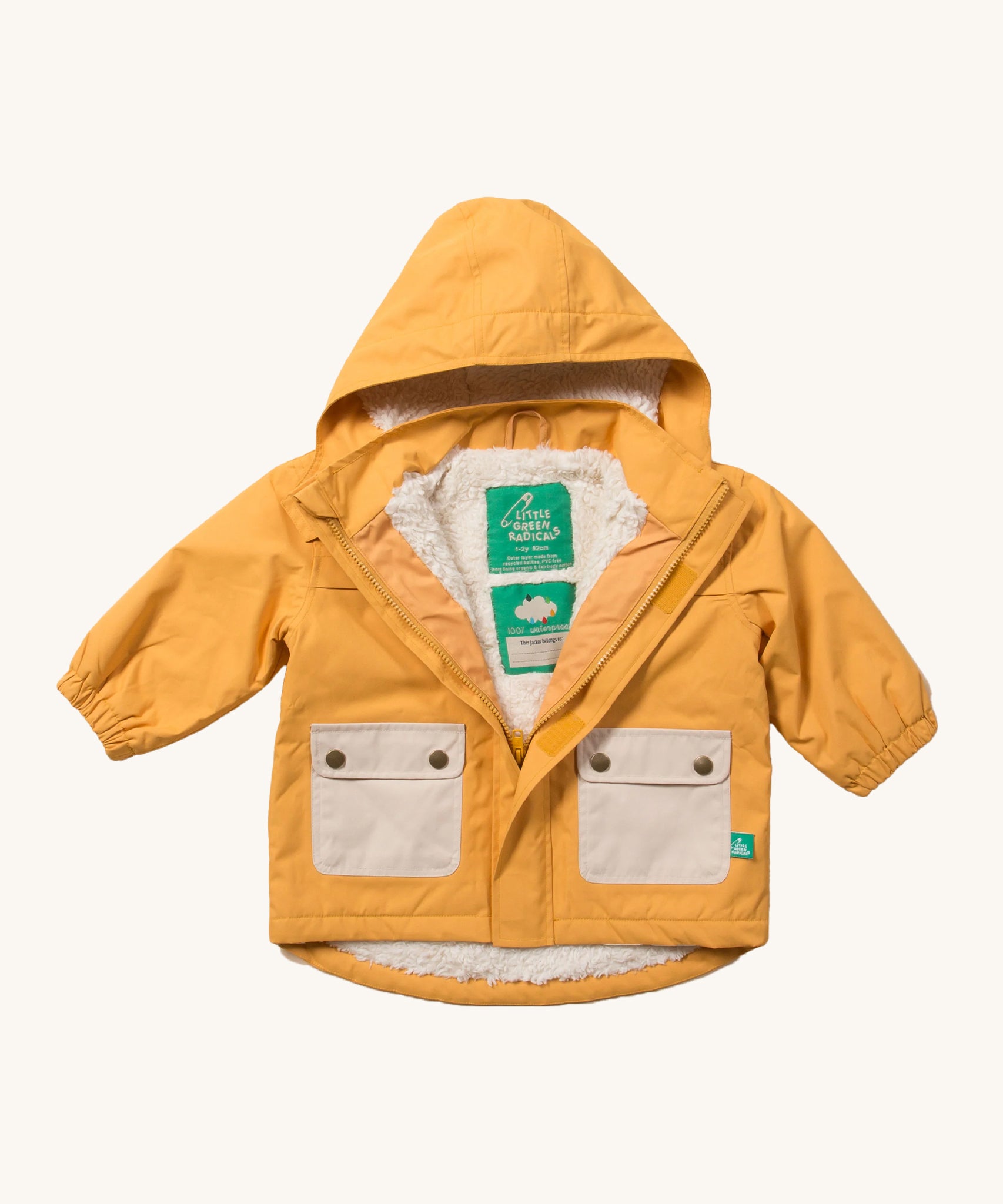 LGR childrens yellow waterproof rain jacket laid out on a cream background