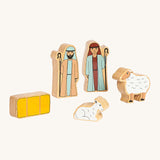 The Shepard and Sheep wooden figures from the Lanka Kade Deluxe Nativity Set on a cream backgroud