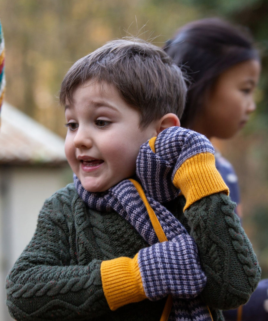 A closer look at the blue stripe and yellow detail on the Dreamy Blue Striped Knitted Mittens