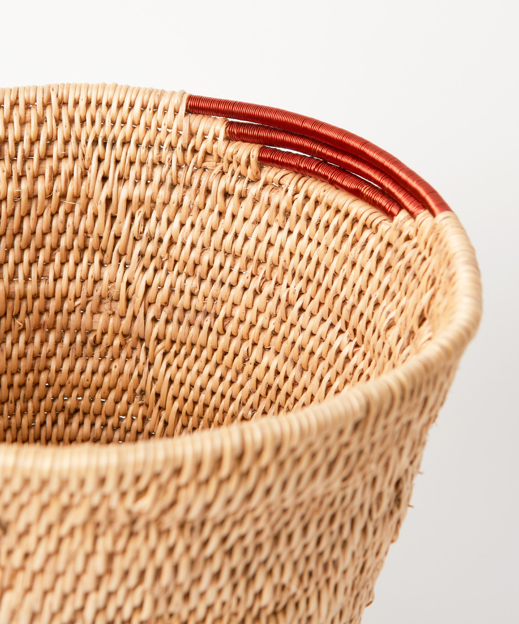 A close up of the copper wire weaving on the MADE51 Small Handmade Makenge Basket