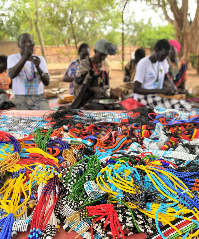 Sudanese Refugees creating bracelets and jewelry