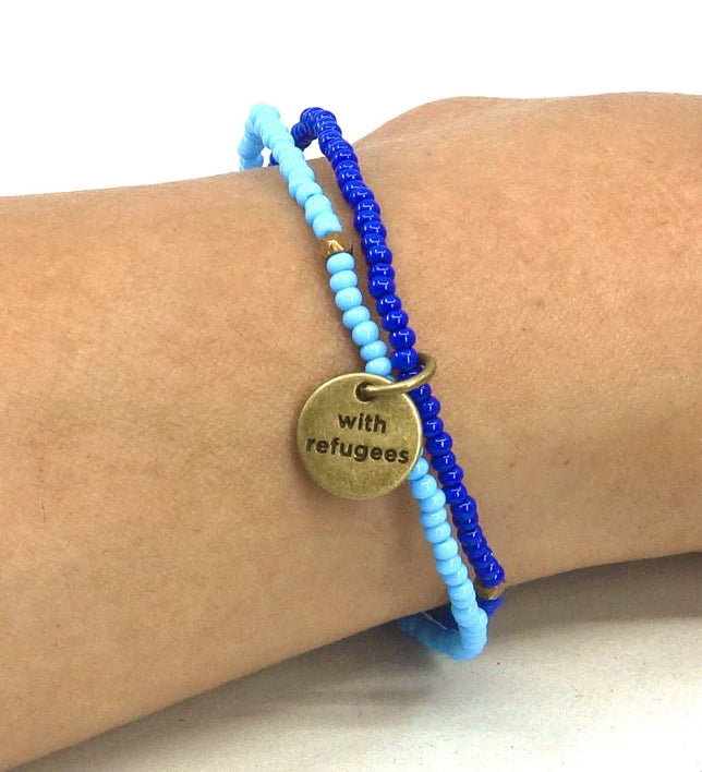 A closer look at the MADE51 Handmade #WithRefugees Bracelet, on a persons wrist