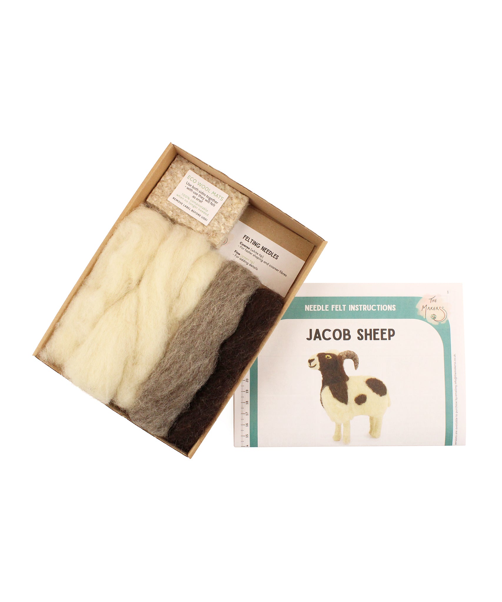 The contents of the The Makerss Jacob Sheep British Wool Needle Felt Kit, includes wool, felting needles, wool mats, and instruction booklet