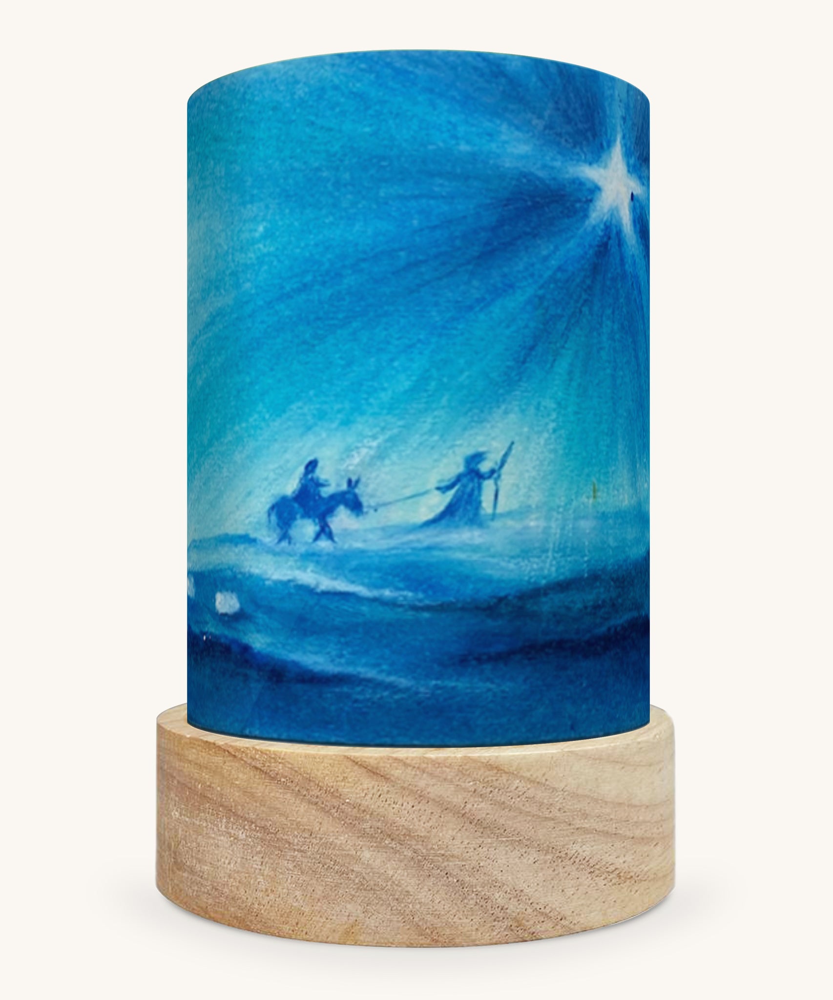 The Maria & Jozef (Mary & Joseph) illustration by Baukje Exler sat in a Toverlux Magic Lantern base, on a cream background