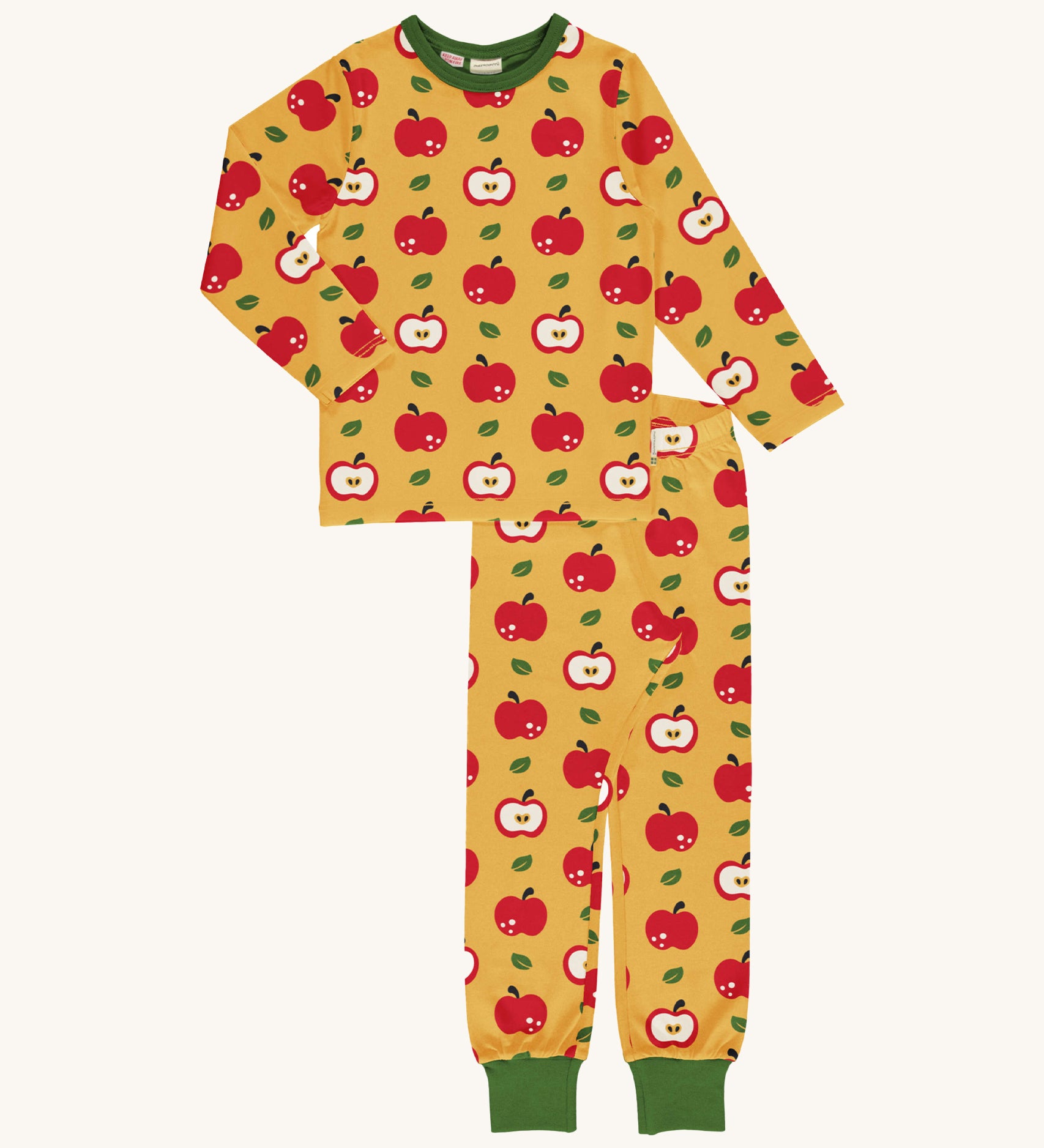 Maxomorra Organic Cotton Apple Long Sleeve Pyjama Set in mustard yellow fabric with red apple print, and green ankle cuffs