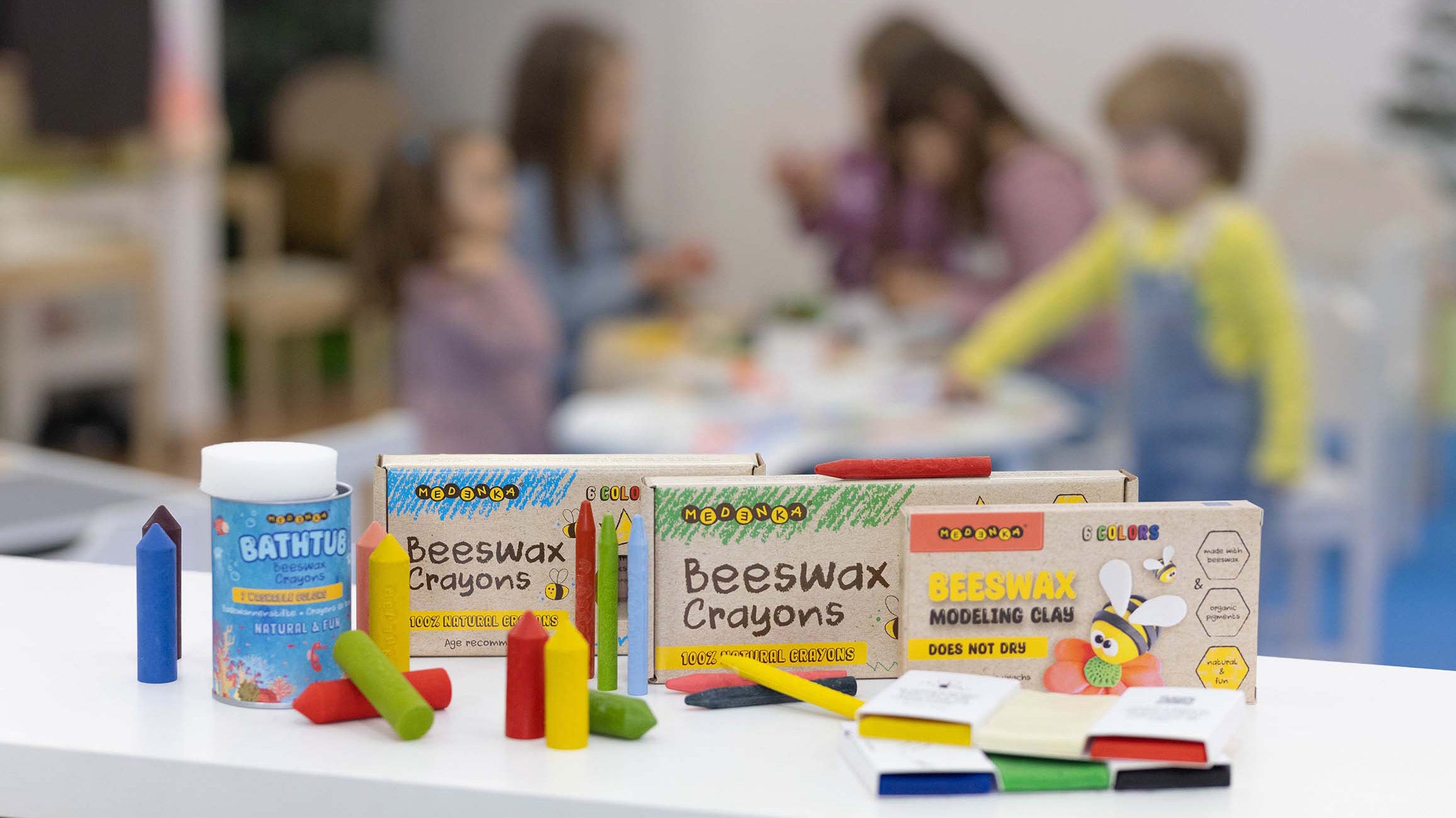 The Medenka natural beeswax art supplies for kids range, laid out on a table.