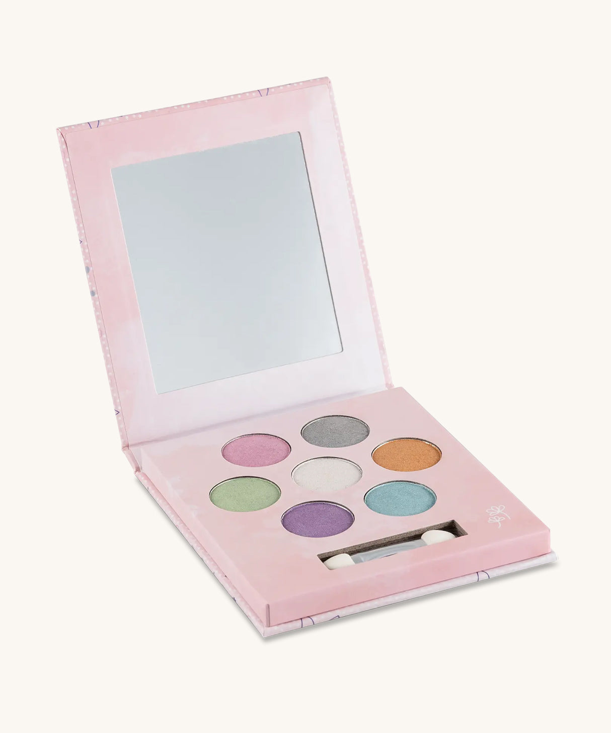 The inside of the Namaki Natural Eyeshadow Pallet - Fawn. The image shows the eye shadow colours which are pink, grey, gold, white, green, blue and purple, on a cream background