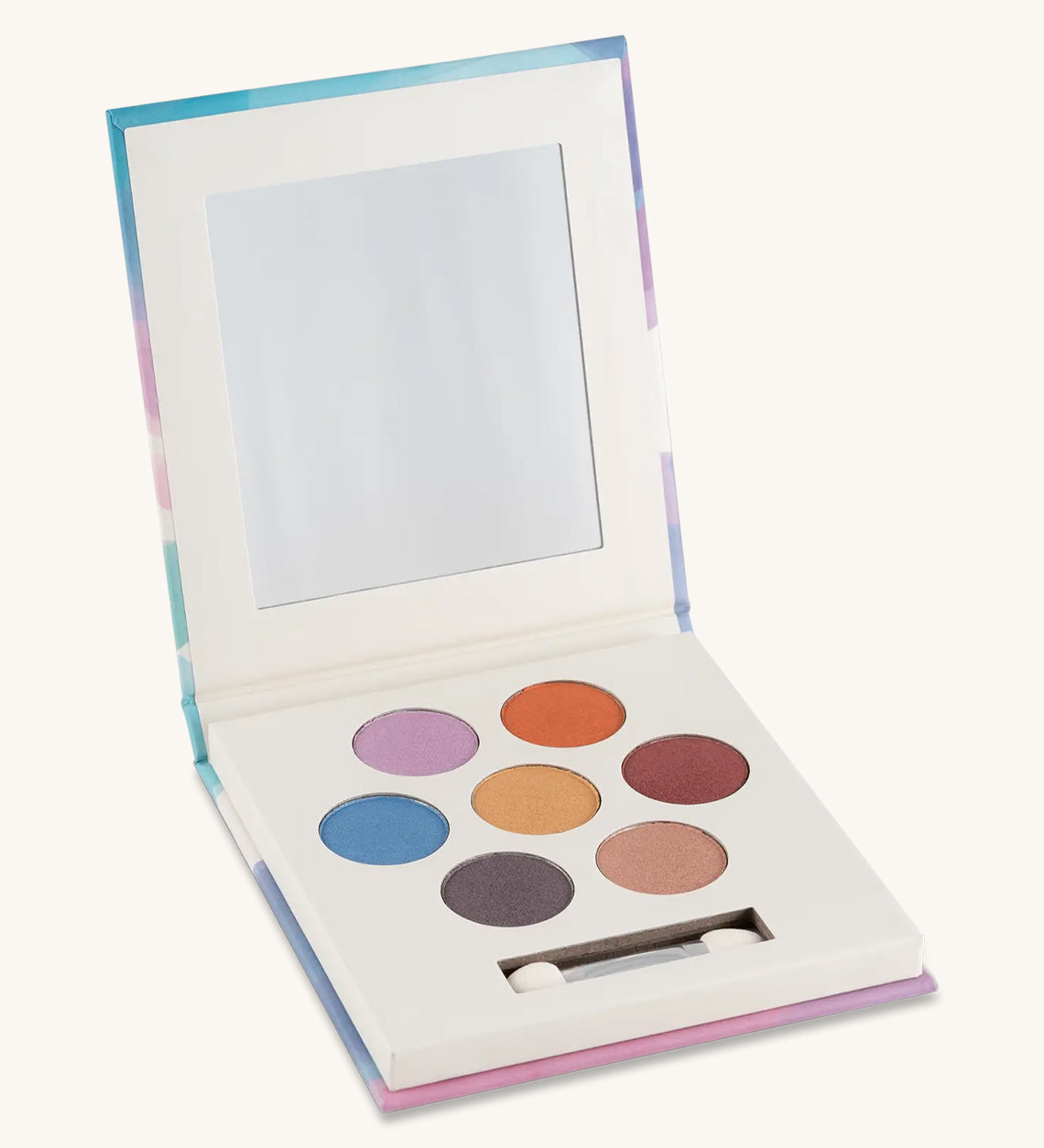 An open Namaki Natural Eyeshadow Pallet - Owl, showing the colours which are pink, orange, maroon, gold, blue, purple and peach on a cream background