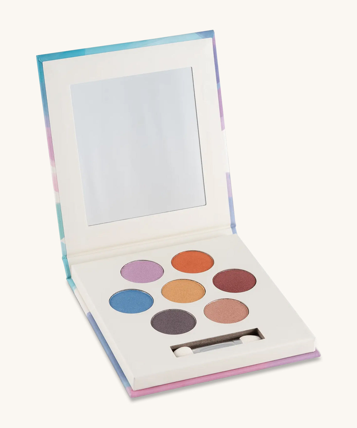 An open Namaki Natural Eyeshadow Pallet - Owl, showing the colours which are pink, orange, maroon, gold, blue, purple and peach on a cream background