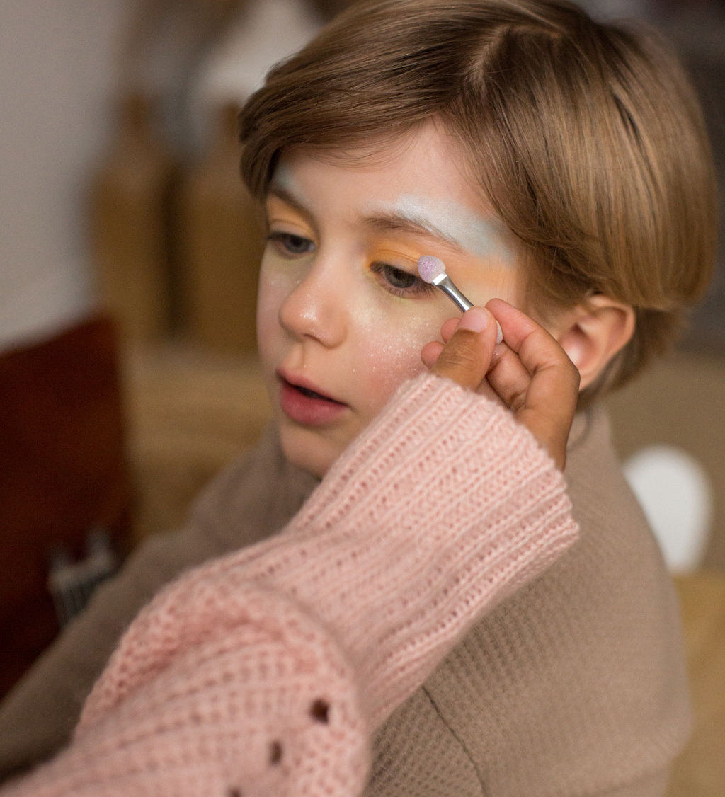 A child wearing the eyeshadow from the Namaki Natural Eyeshadow Pallet - Owl