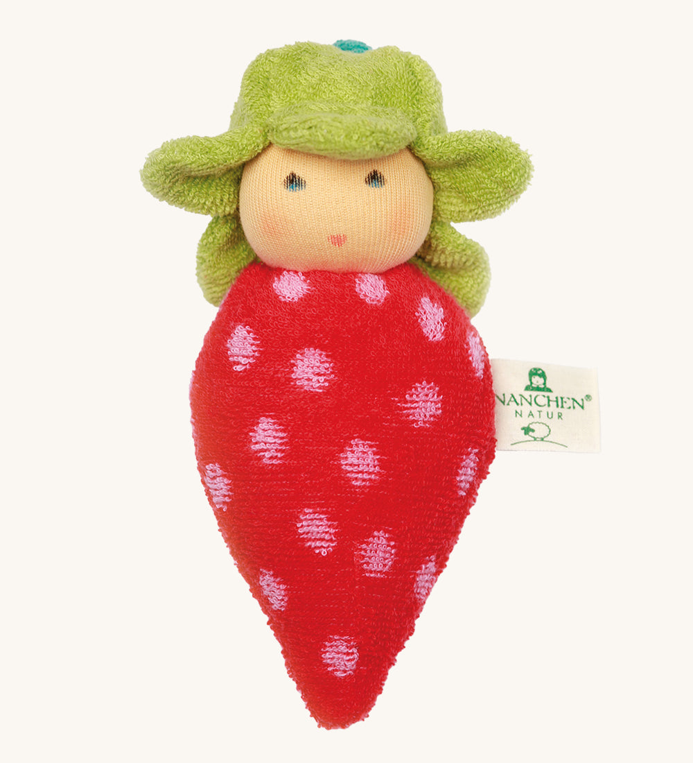 Nanchen Strawberry Rattle Doll. An adorable hand crafted rattle doll, in the shape of a strawberry. With a red and white spotted body and a green hat resembling the leaves on a strawberry