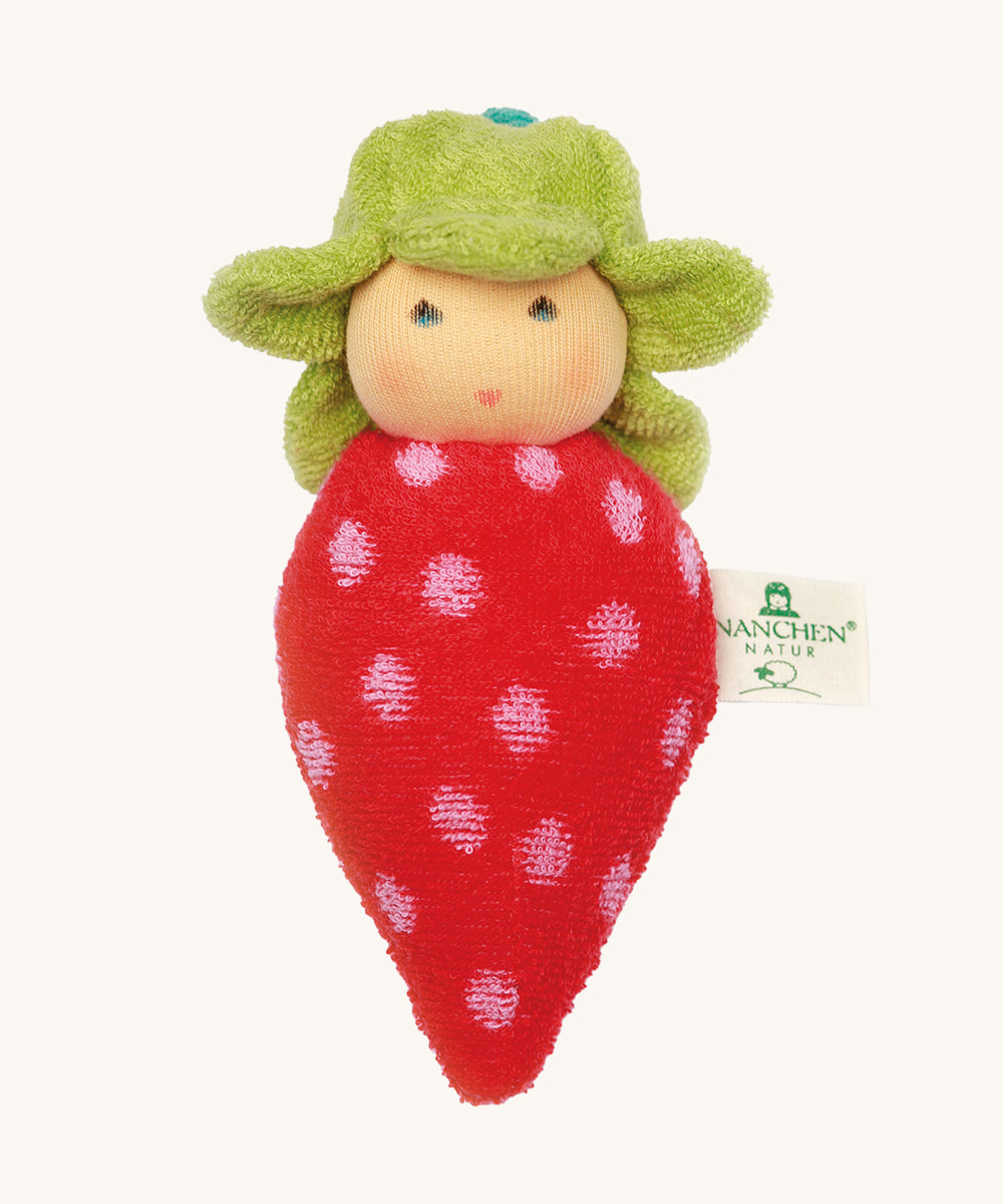 Nanchen Strawberry Rattle Doll. An adorable hand crafted rattle doll, in the shape of a strawberry. With a red and white spotted body and a green hat resembling the leaves on a strawberry