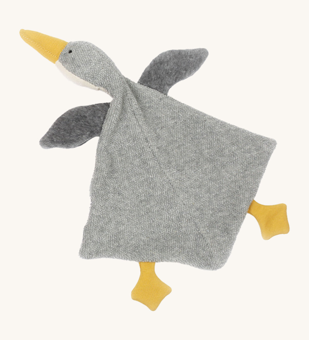 Nanchen Baby Comforter - Grey Goose. A beautifully handmade and soft grey goose comforter toy with a yellow beak and two yellow feet, on a cream background.