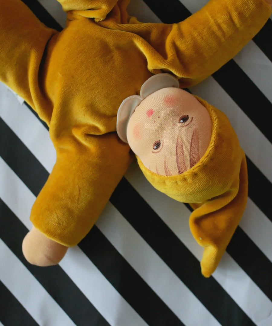 A closer look at the Nanchen Nani Waldorf Doll, showing the detail on the face