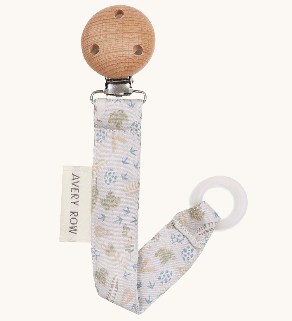 Avery Row Pacifier Holder - Nature Trail, showing the silicone ring and wooden clip