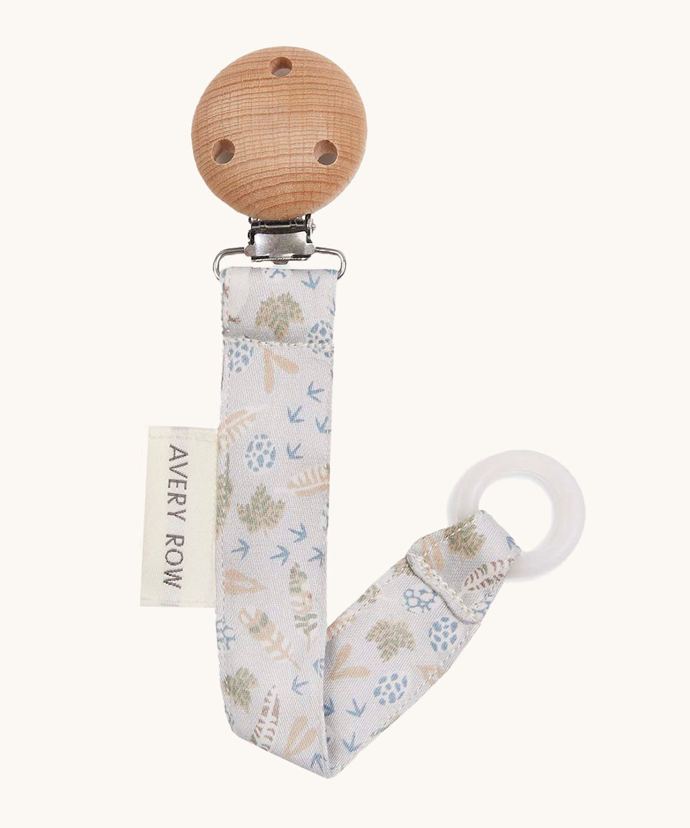 Avery Row Pacifier Holder - Nature Trail, showing the silicone ring and wooden clip