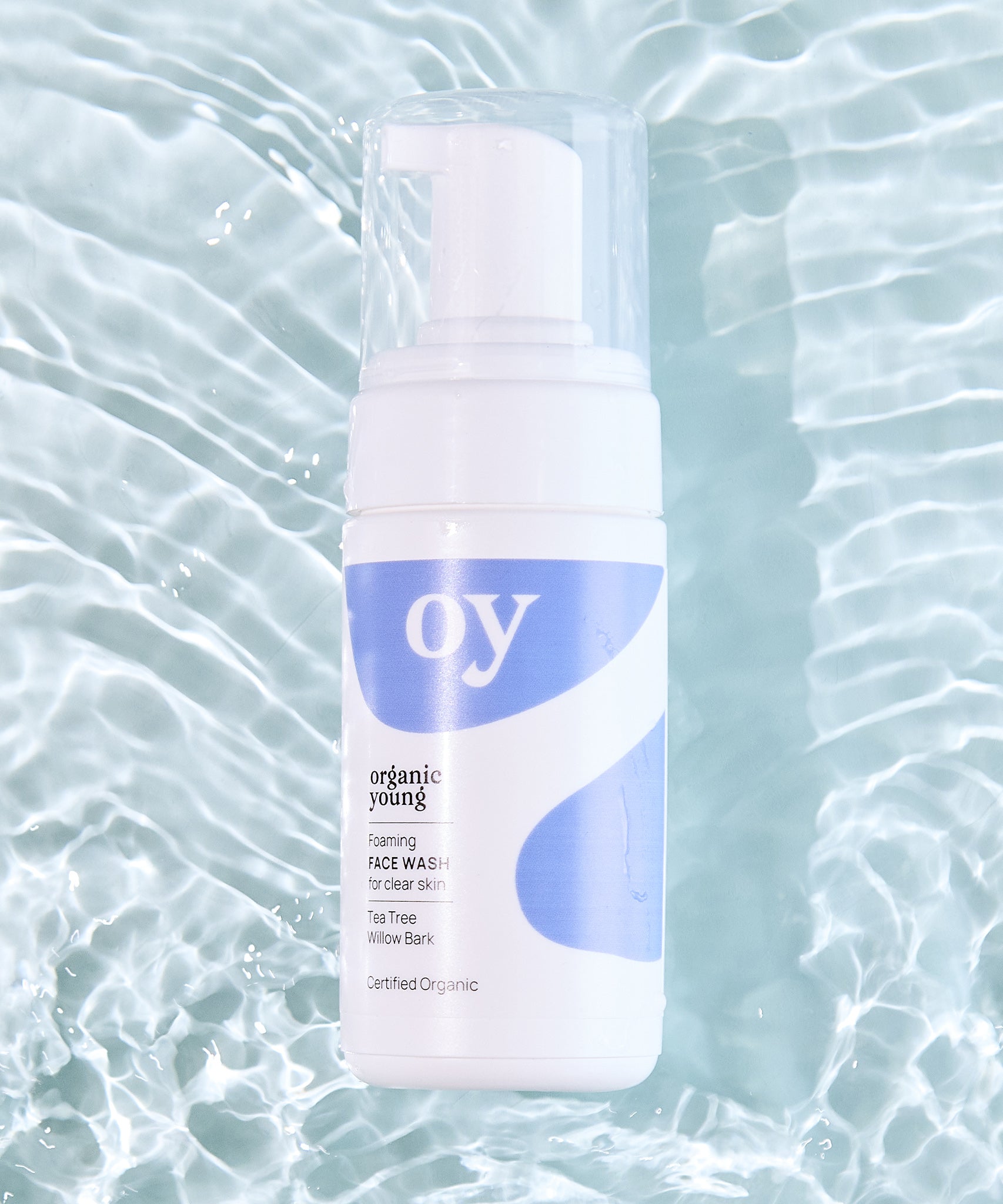 The OY Face Wash with a watery background