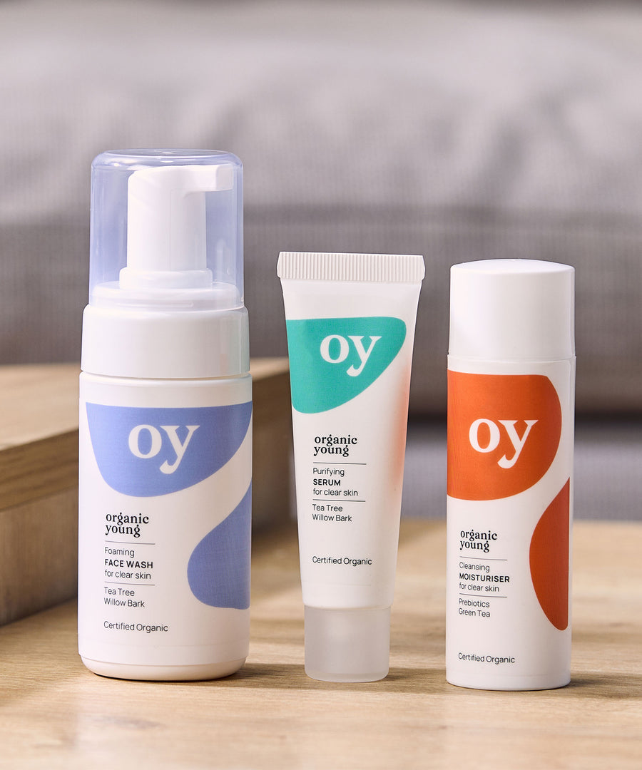 A collection of the OY skin care range, including foaming face wash, purifying serum and cleansing moisturiser 