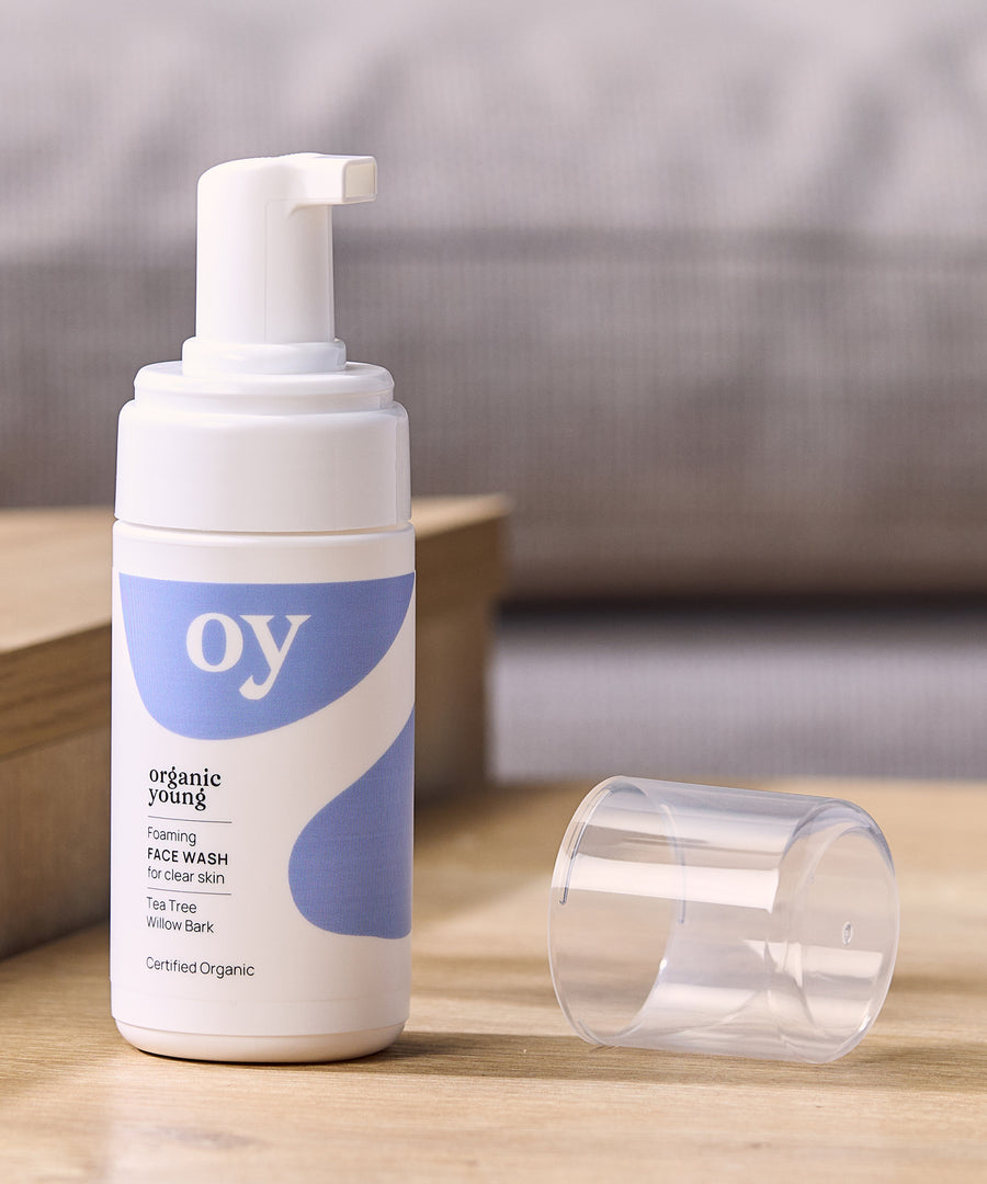 The OY Face wash pump bottle stood next to the lid