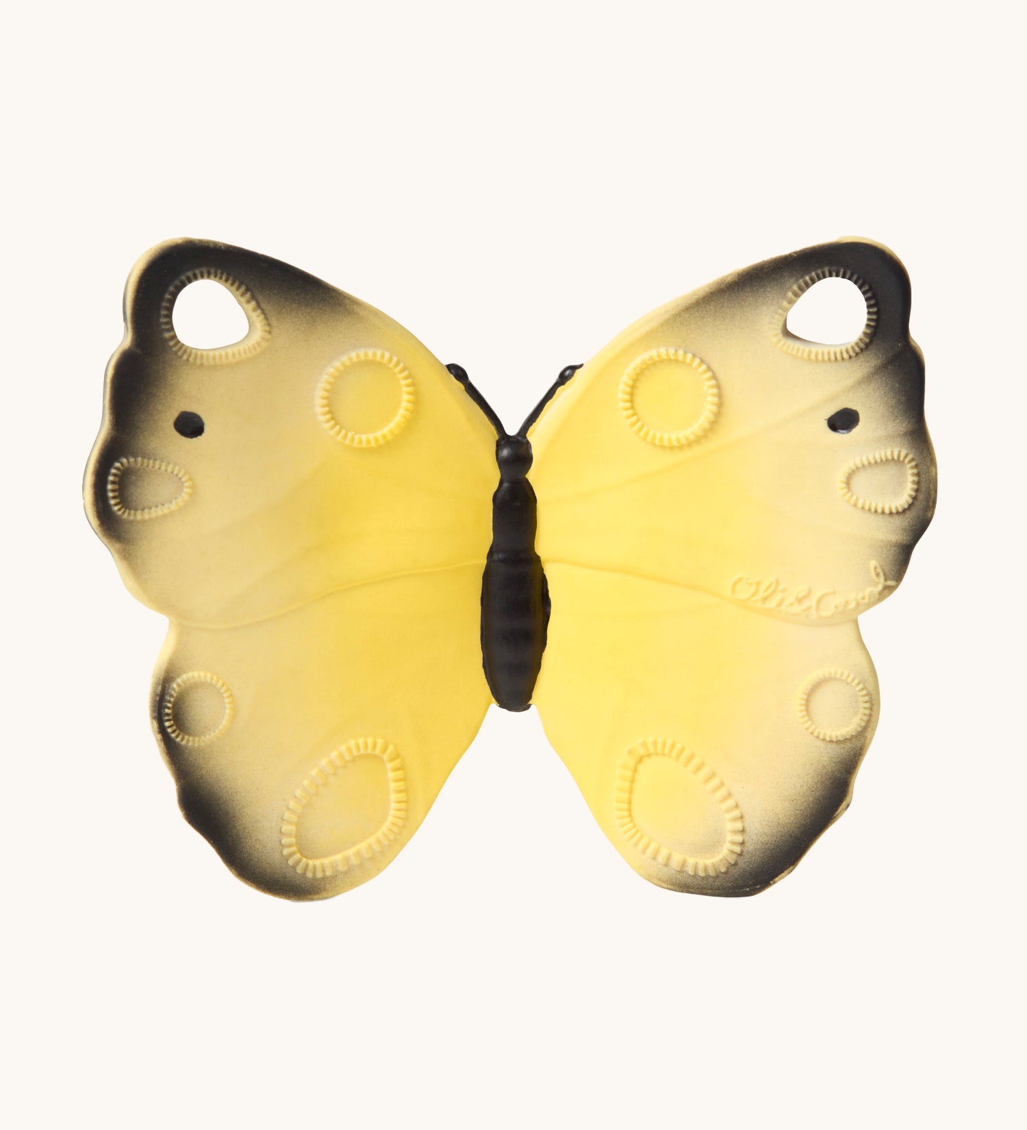 The Oli & Carol Natural Rubber Teether - Katia The Butterfly, showing a yellow natural rubber teether on a cream background