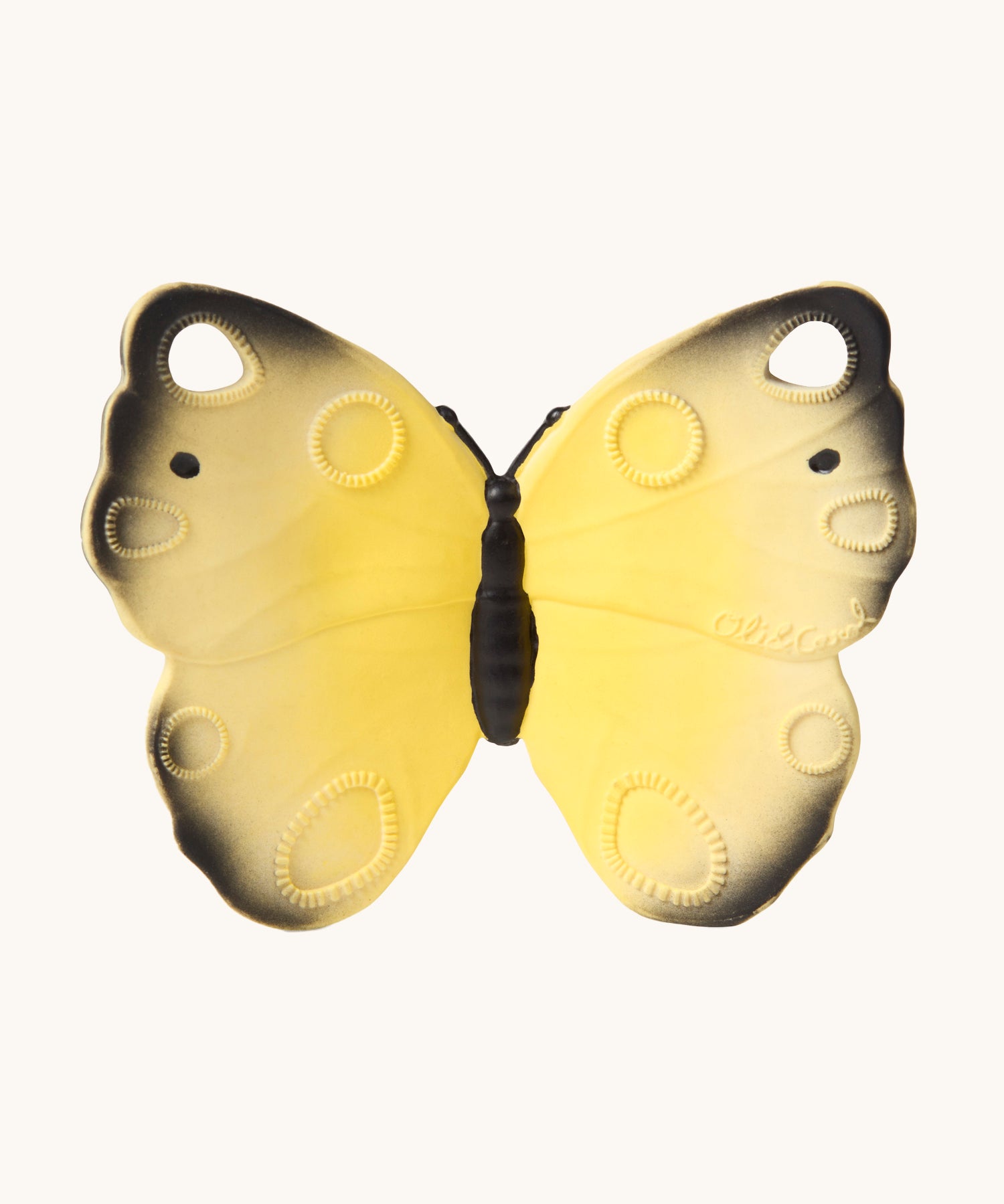 The Oli & Carol Natural Rubber Teether - Katia The Butterfly, showing a yellow natural rubber teether on a cream background