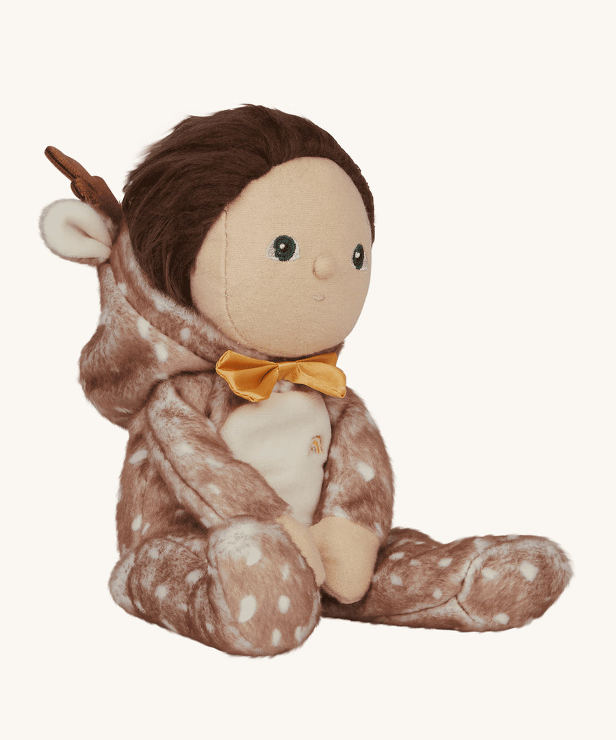 Riley Reindeer with its hood down, showing all of Riley's medium length, brown hair on a cream background