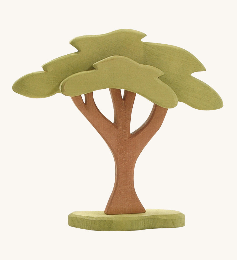 Ostheimer African Tree is beautifully crafted and hand painted, with green leaves, brown branches and tree trunk, and a green base support. Perfect for animal figures to shade in the sun