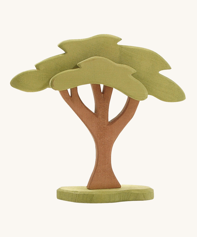 Ostheimer African Tree is beautifully crafted and hand painted, with green leaves, brown branches and tree trunk, and a green base support. Perfect for animal figures to shade in the sun